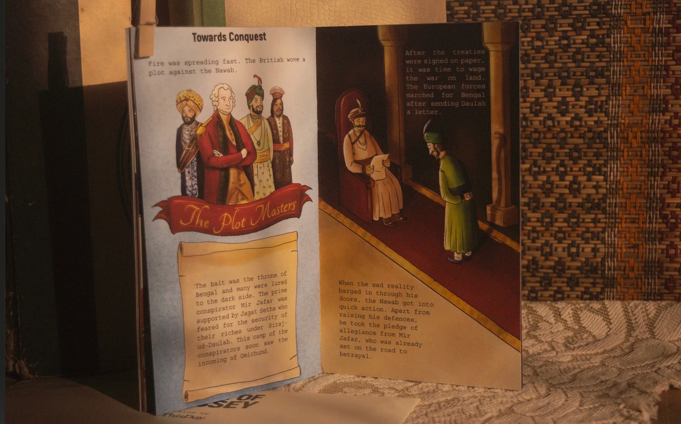 Open spread of the Battle of Plassey zine showing Robert Clive and the Nawab's court in rich illustrated panels