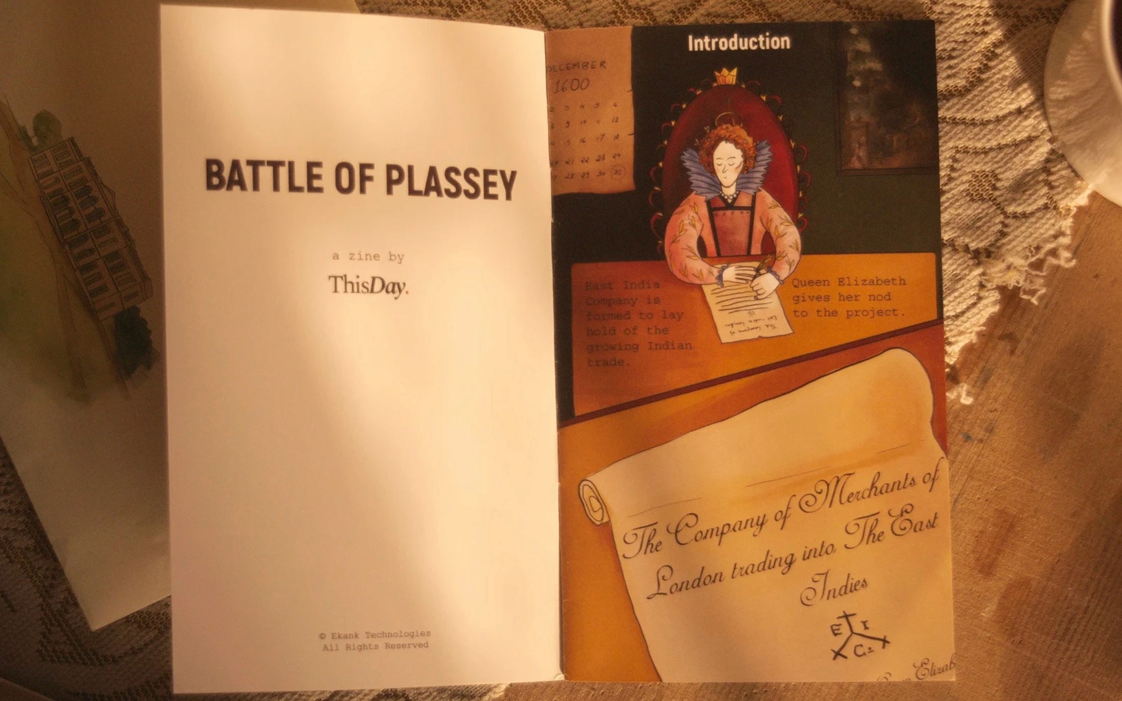 Battle of Plassey zine open to its introduction with an illustration of Queen Elizabeth I and the East India Company charter