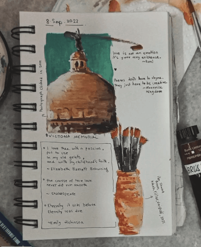 Watercolour sketchbook page of the Victoria Memorial dome and a jar of paintbrushes, with handwritten quotes