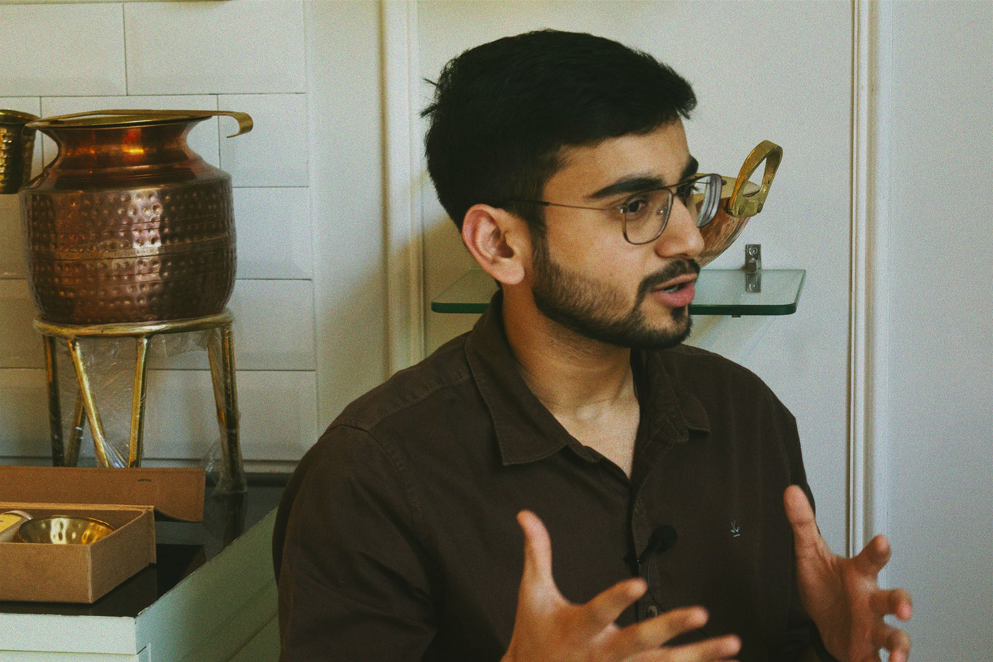 P-Tal founder Aditya Agrawal gesturing as he talks about traditional Indian utensils